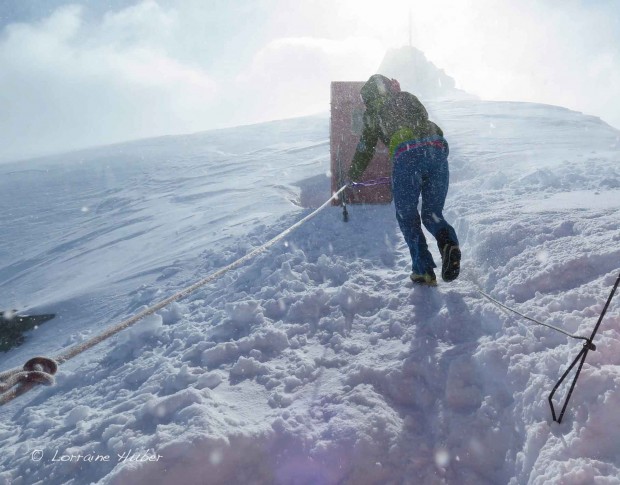 Tying into a fixed rope to get to the outhouse safely in a 200 km/hr storm